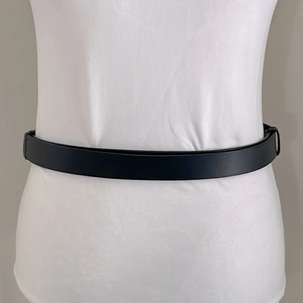 Chico’s black leather adjustable‎ belt. Silver hook buckle. Size Medium - Large